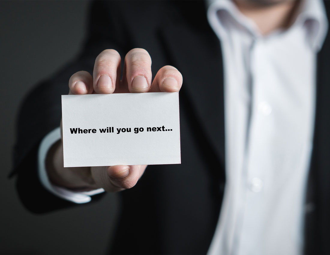 person holding a business card