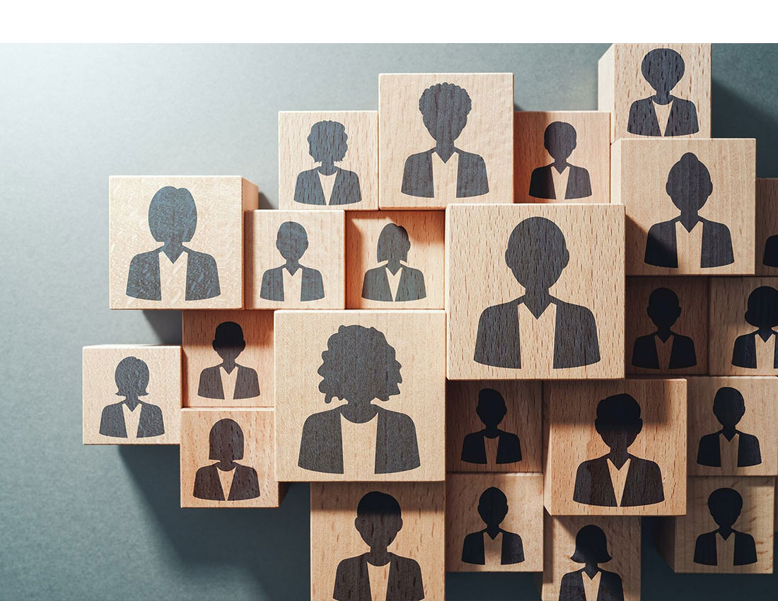 wood blocks with silhouettes of people