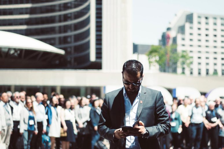a man lost in the crowd of people